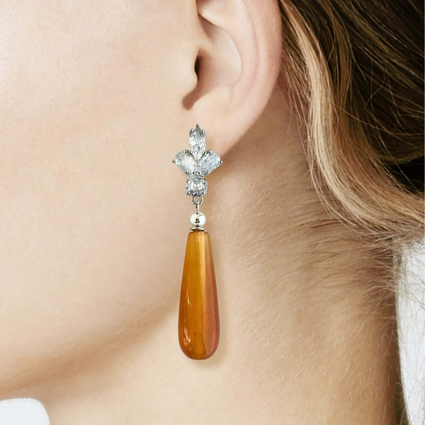 Loux oorbellen met oranje natuursteen