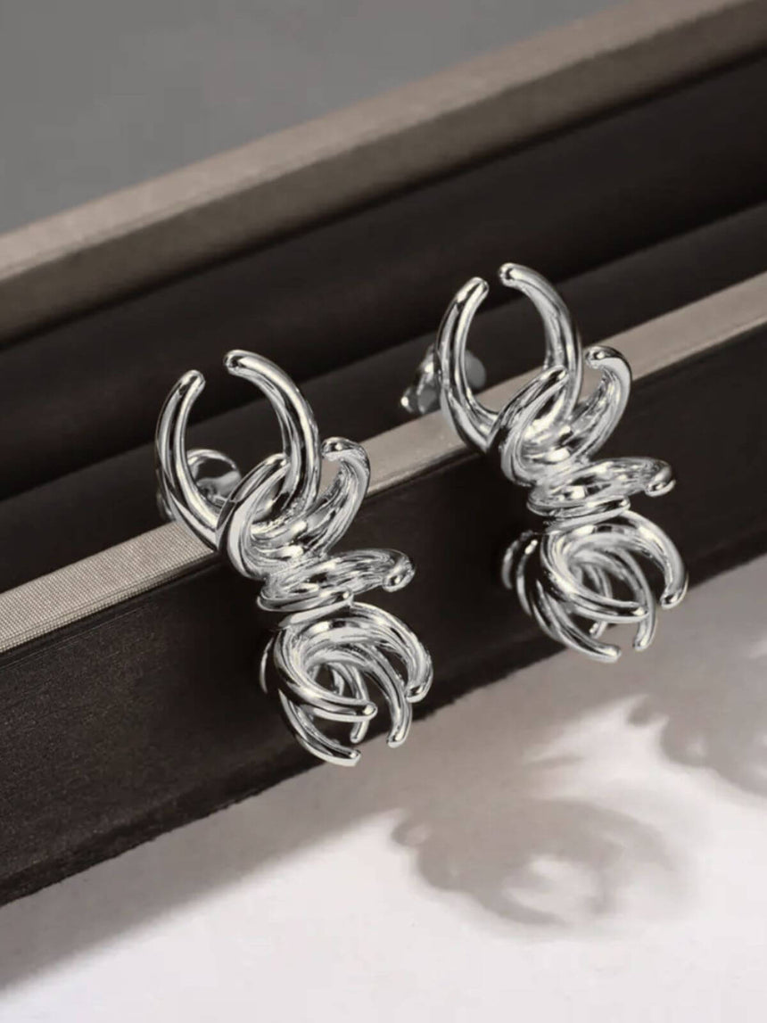 Luan verzilverde open oorringen