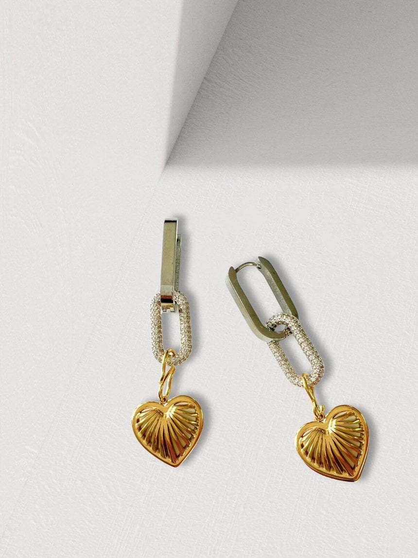 Lutz oorbellen met zirkonia en hart bedel