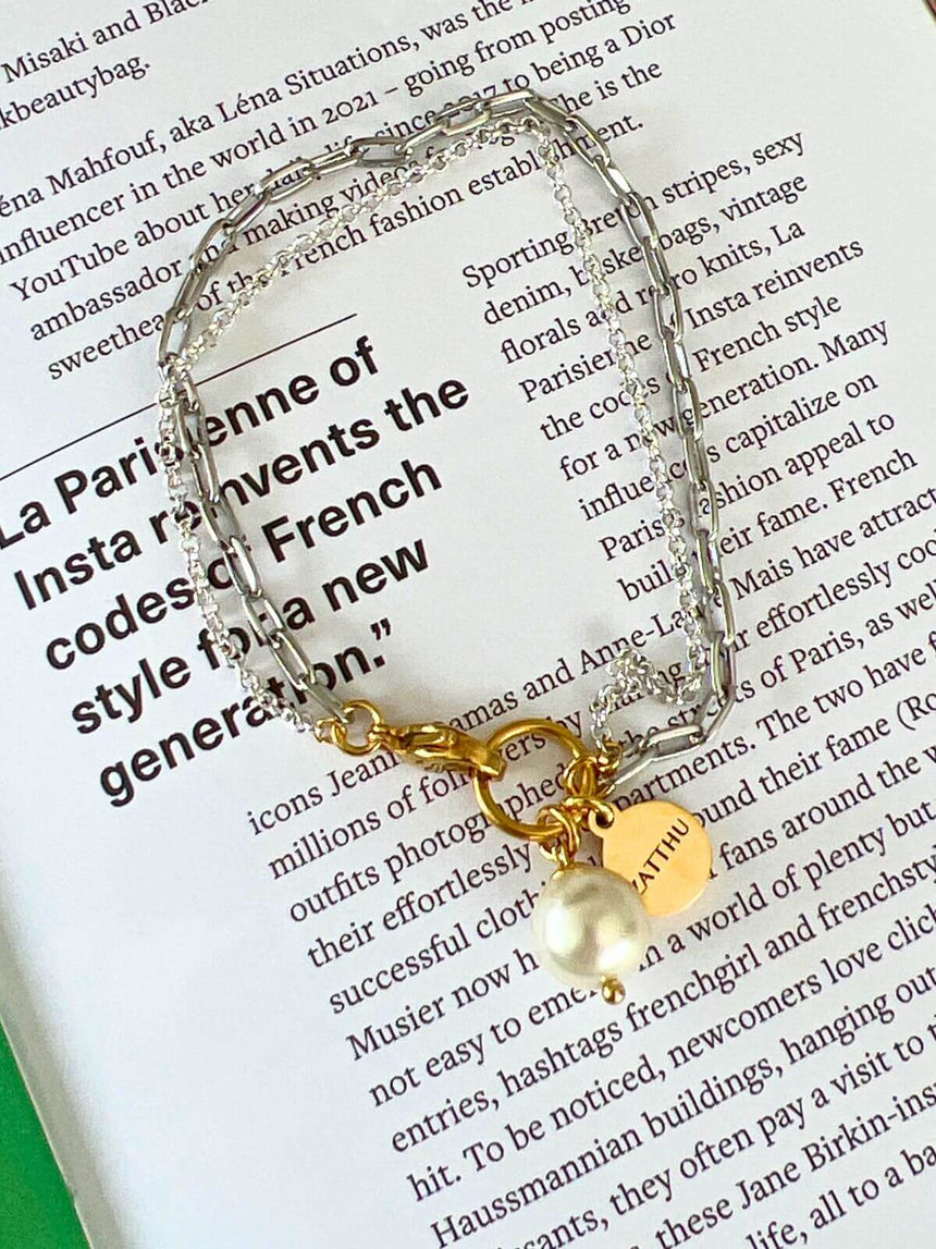 Luus dubbele schakelarmband met parel hanger