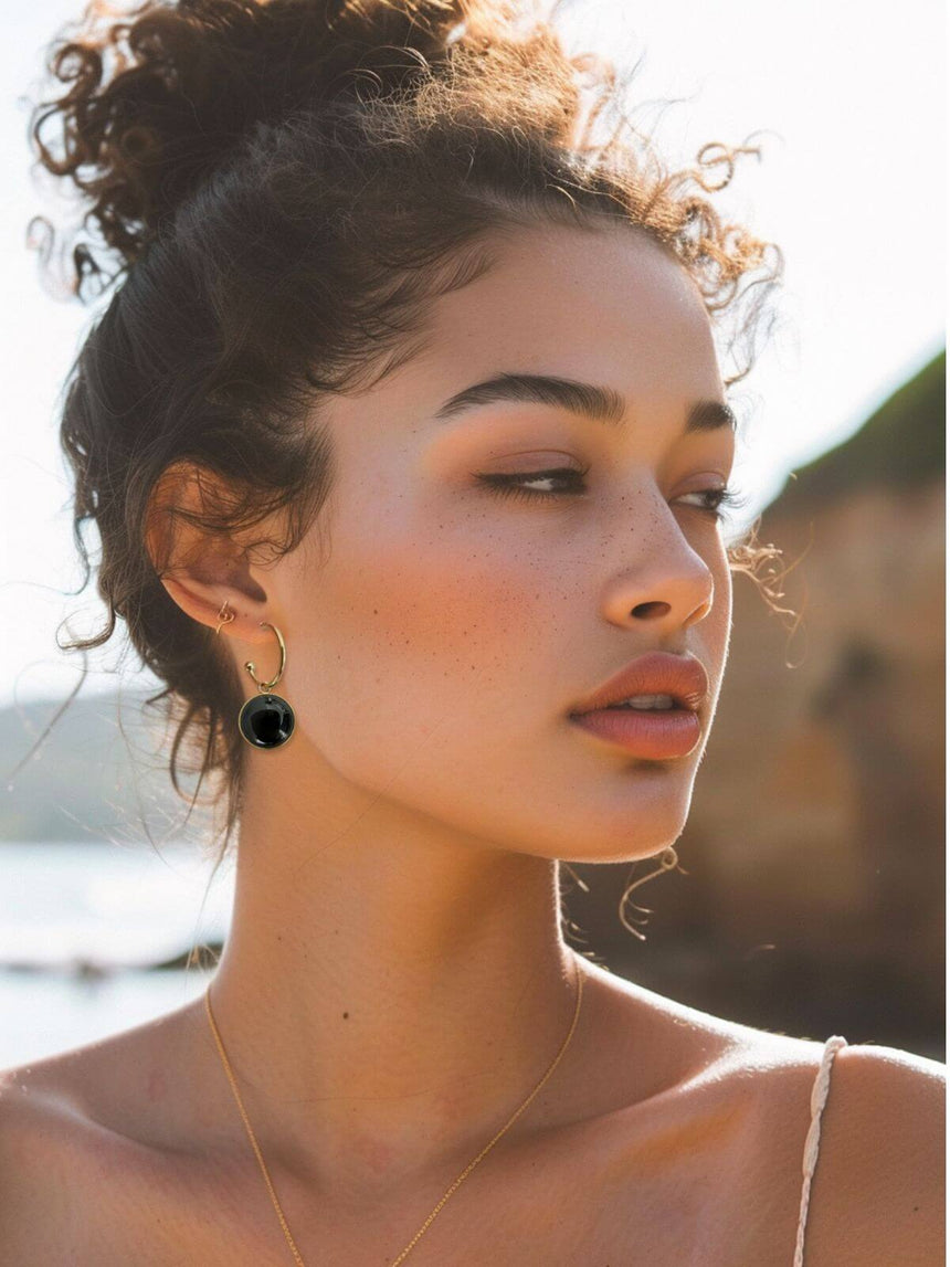 Mack gouden oorringen met zwarte agaat