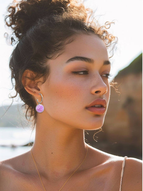 Mady zilveren oorringen met lila steen