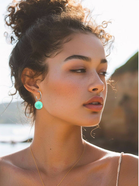 Magi zilveren oorringen met mintkleurige steen