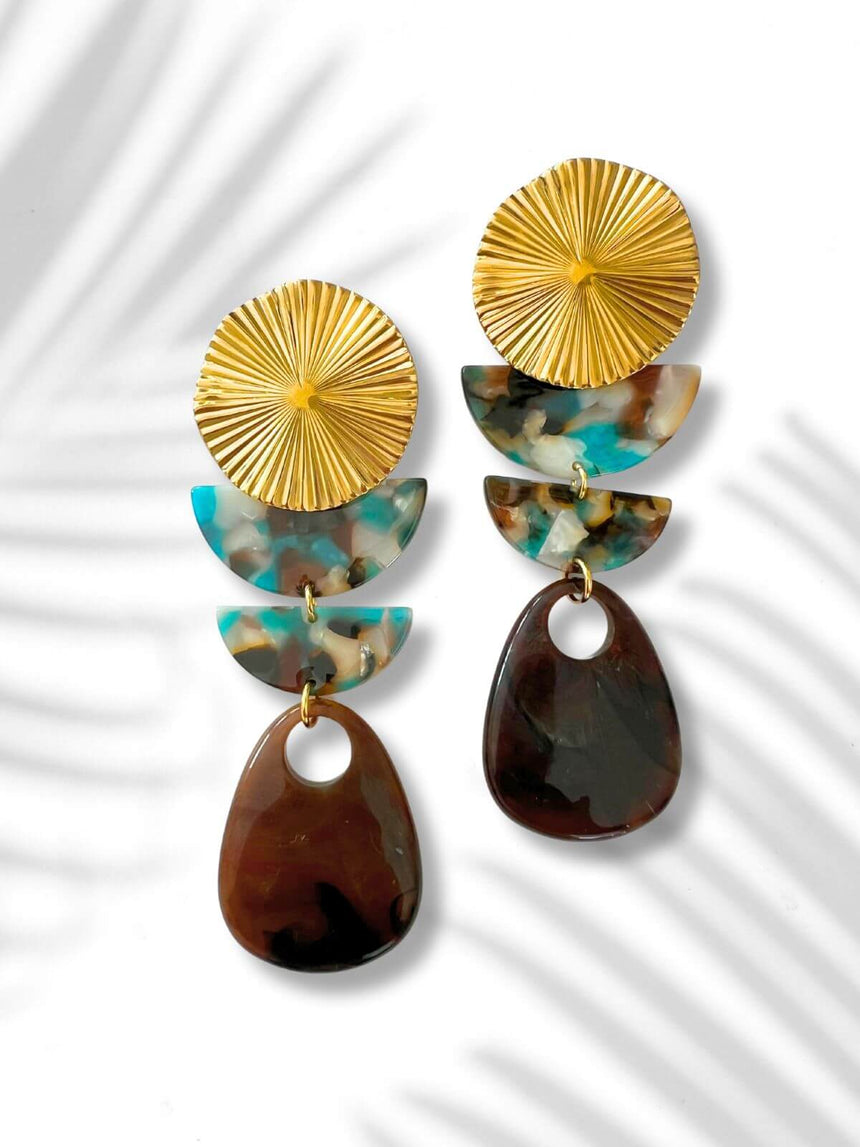 Mana lange turquoise statement oorbellen