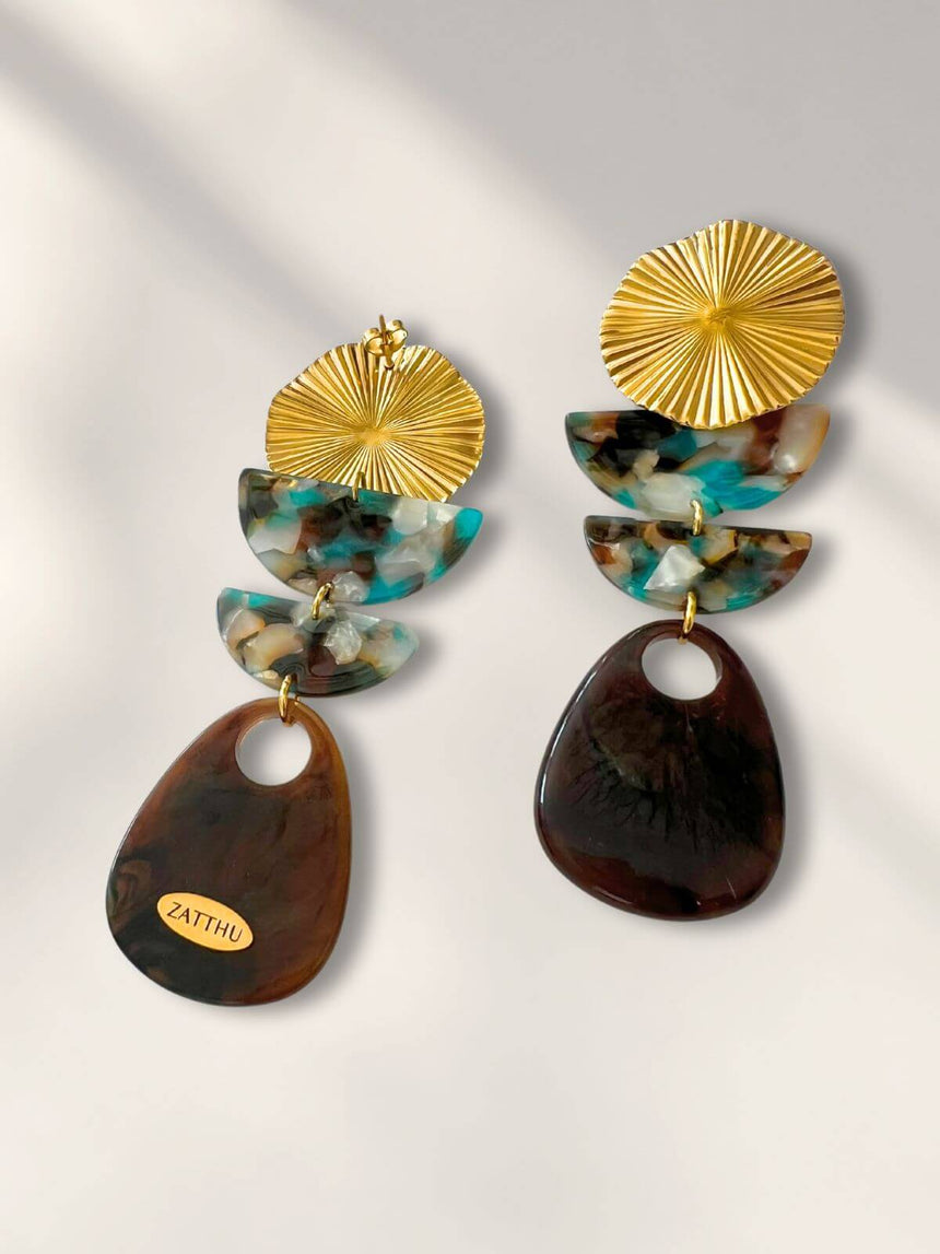 Mana lange turquoise statement oorbellen