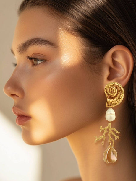 Zomerse oorbellen met ronde vorm en natuurlijke schelp