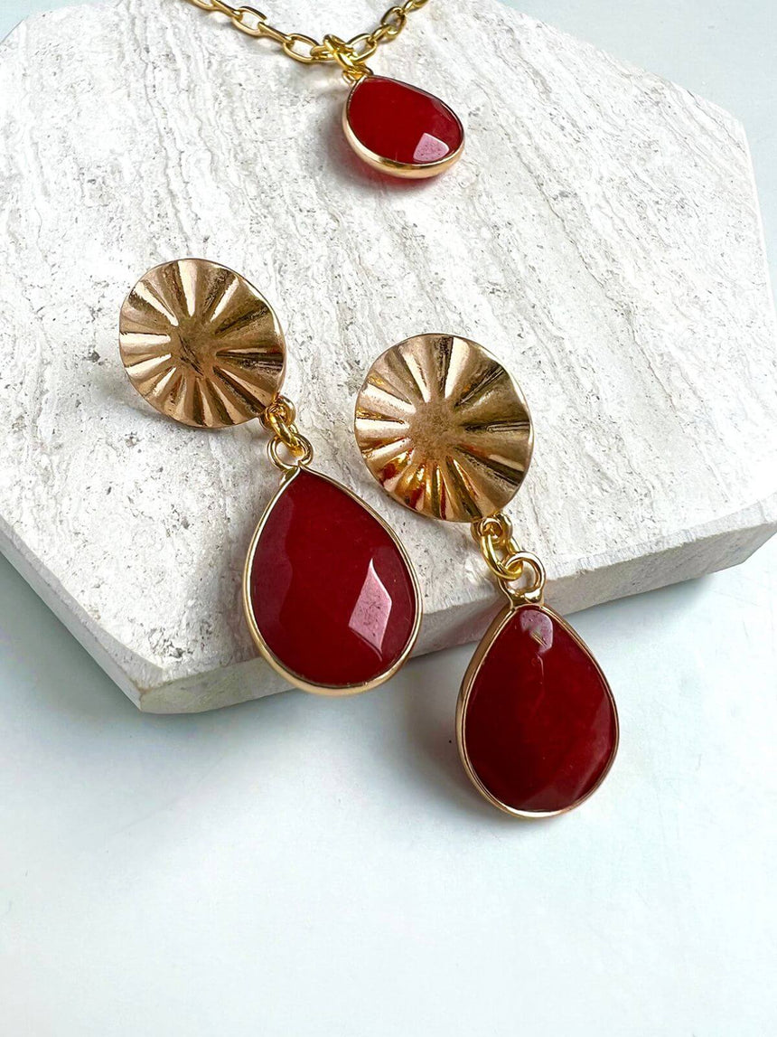 Kani oorbellen met rode hanger