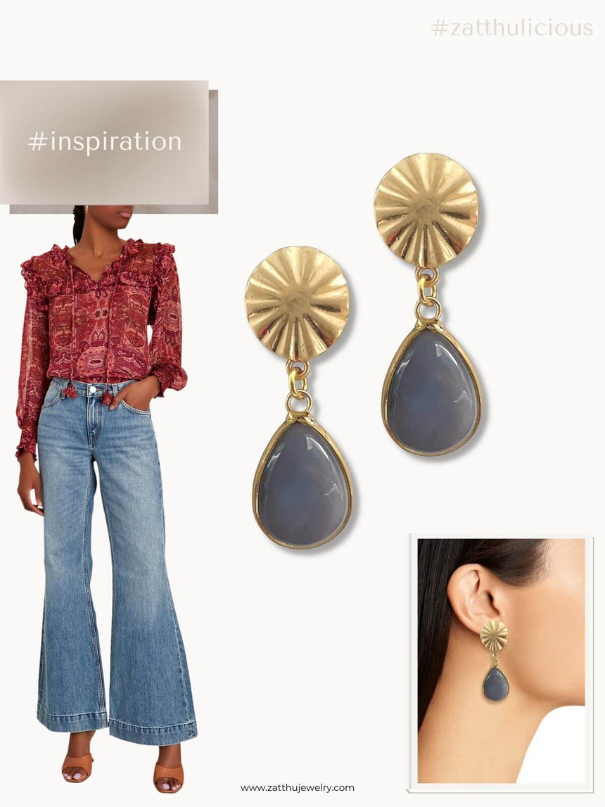 Kara oorbellen met grijze hanger