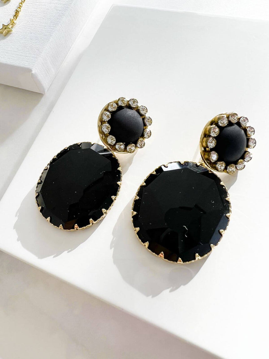 Joan statement oorbellen zwart kristal