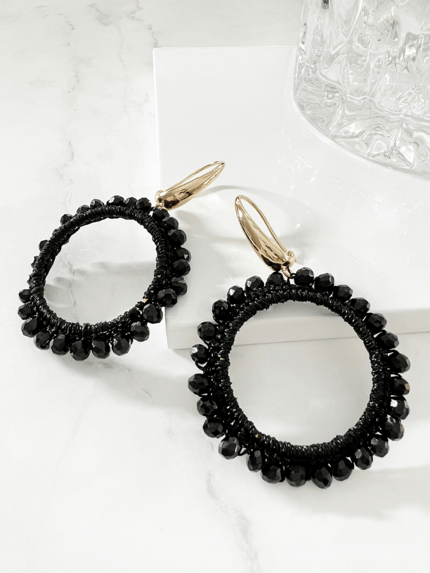 Inas oorbellen met zwarte kraaltjes