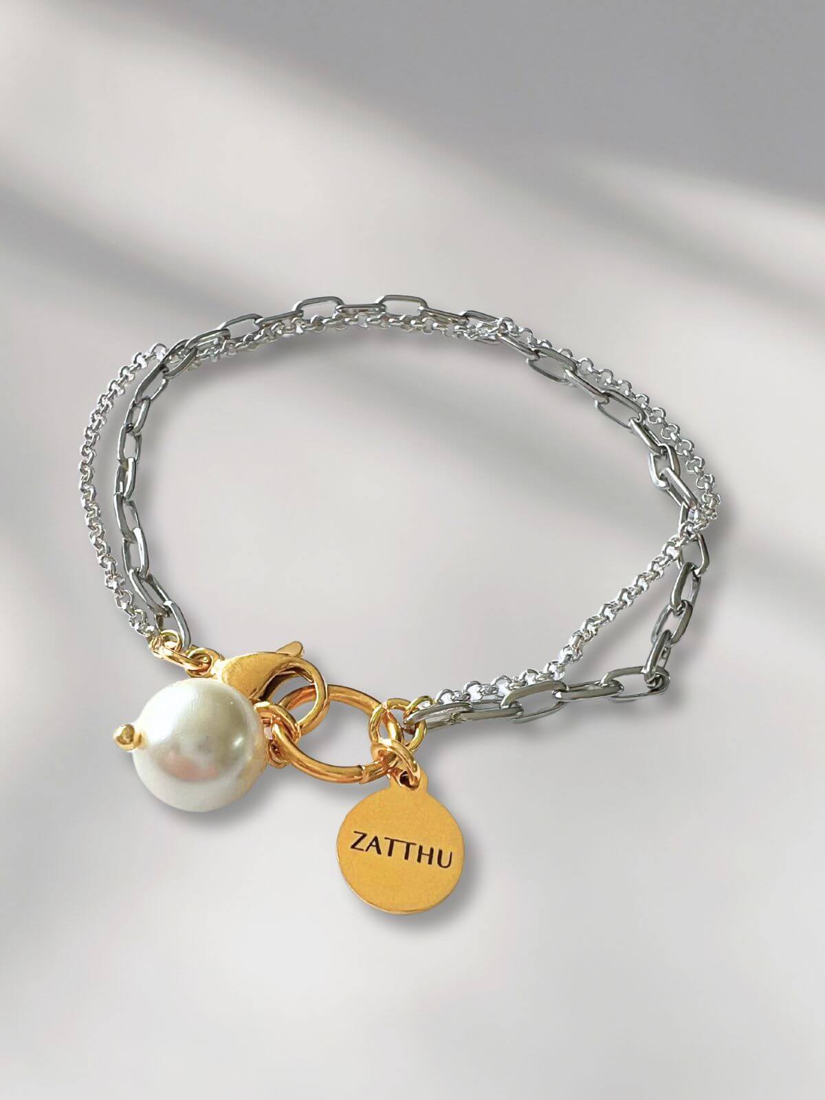 Luus dubbele schakelarmband met parel hanger