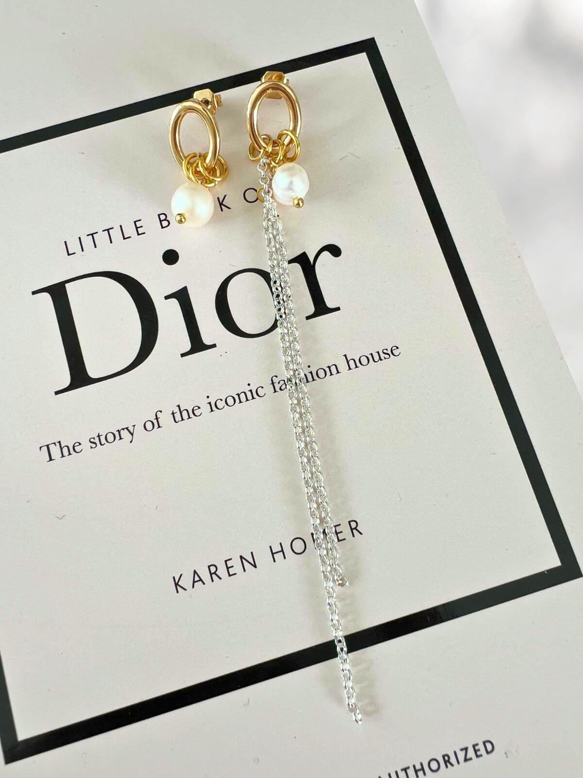 Luva mismatched oorbellen met parel