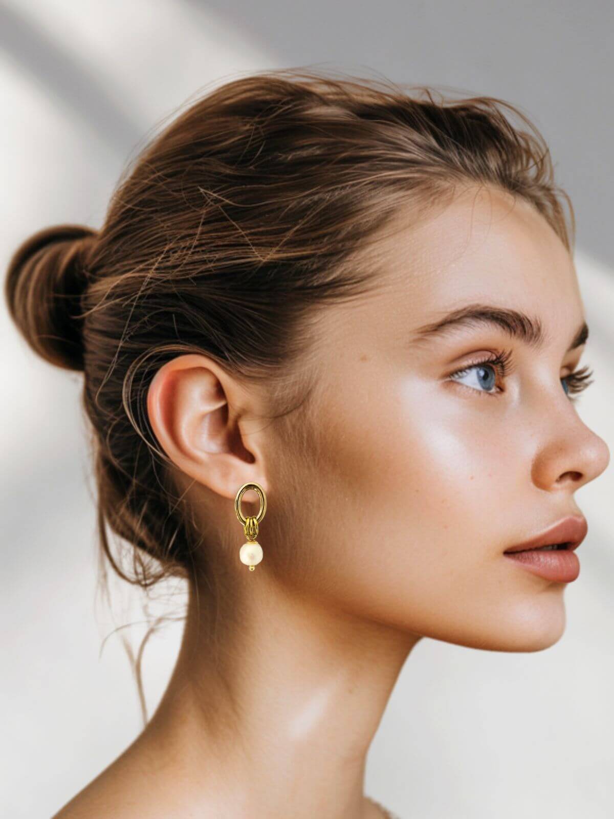 Luva mismatched oorbellen met parel