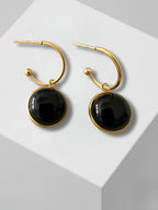 Mack gouden oorringen met zwarte agaat