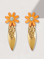 Oranje statement oorbellen met bloemontwerp, messing en hars, zirkonia accenten
