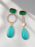 Turquoise druppelvormige oorbellen Nada – speels en stijlvol