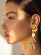 Zomerse oorbellen met ronde vorm en natuurlijke schelp