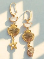 Goudkleurige oorbellen met kristal en schelp voor dames