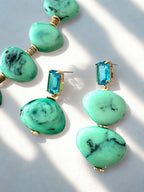 Lange asymmetrische oorbellen met unieke vorm