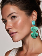 Handgemaakte lange oorbellen in turquoise en goudkleur