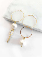 Asymmetrische oorringen met parel