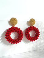 Kati ronde statement oorbellen rood