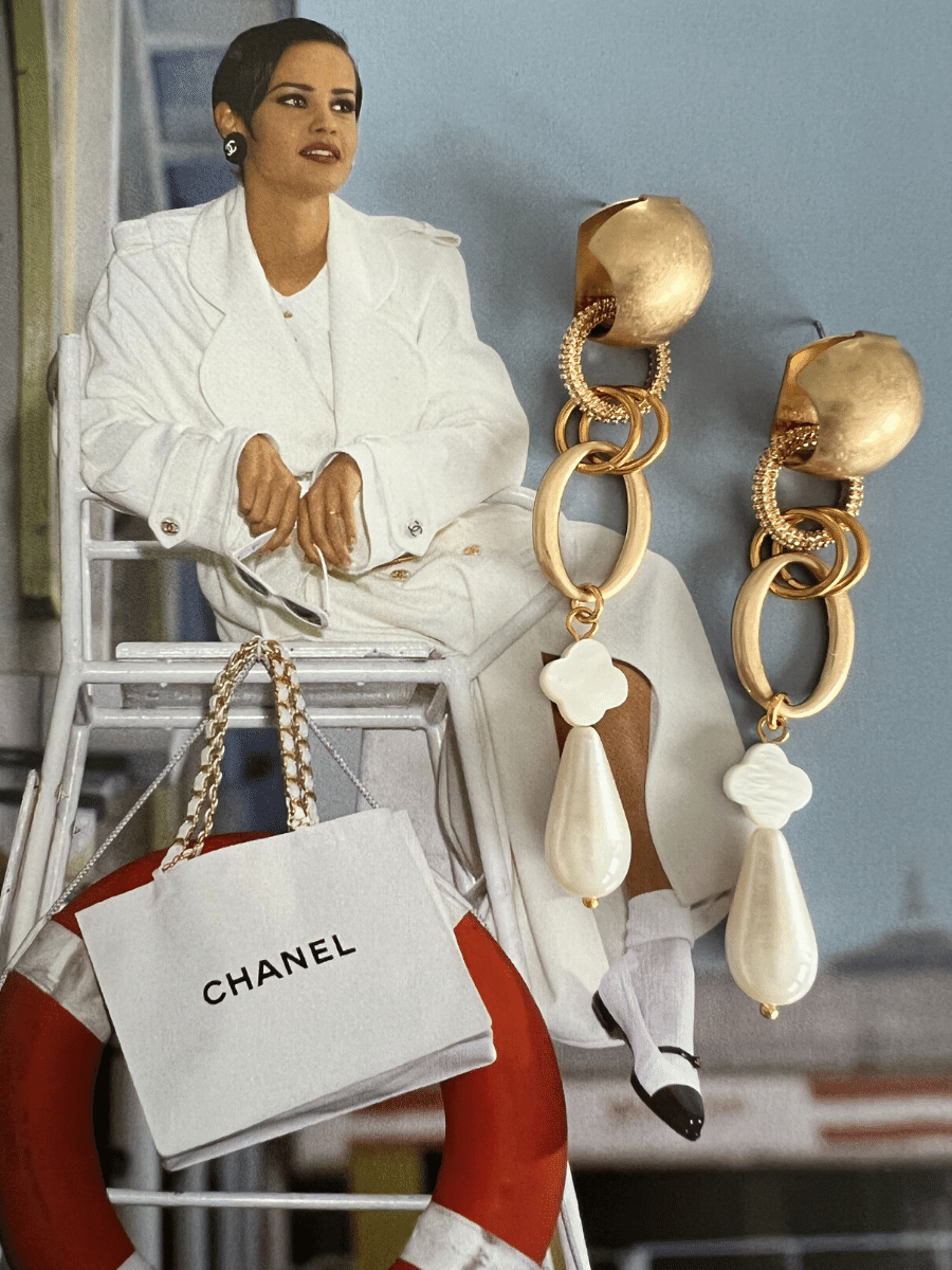 Iman statement oorbellen met druppel