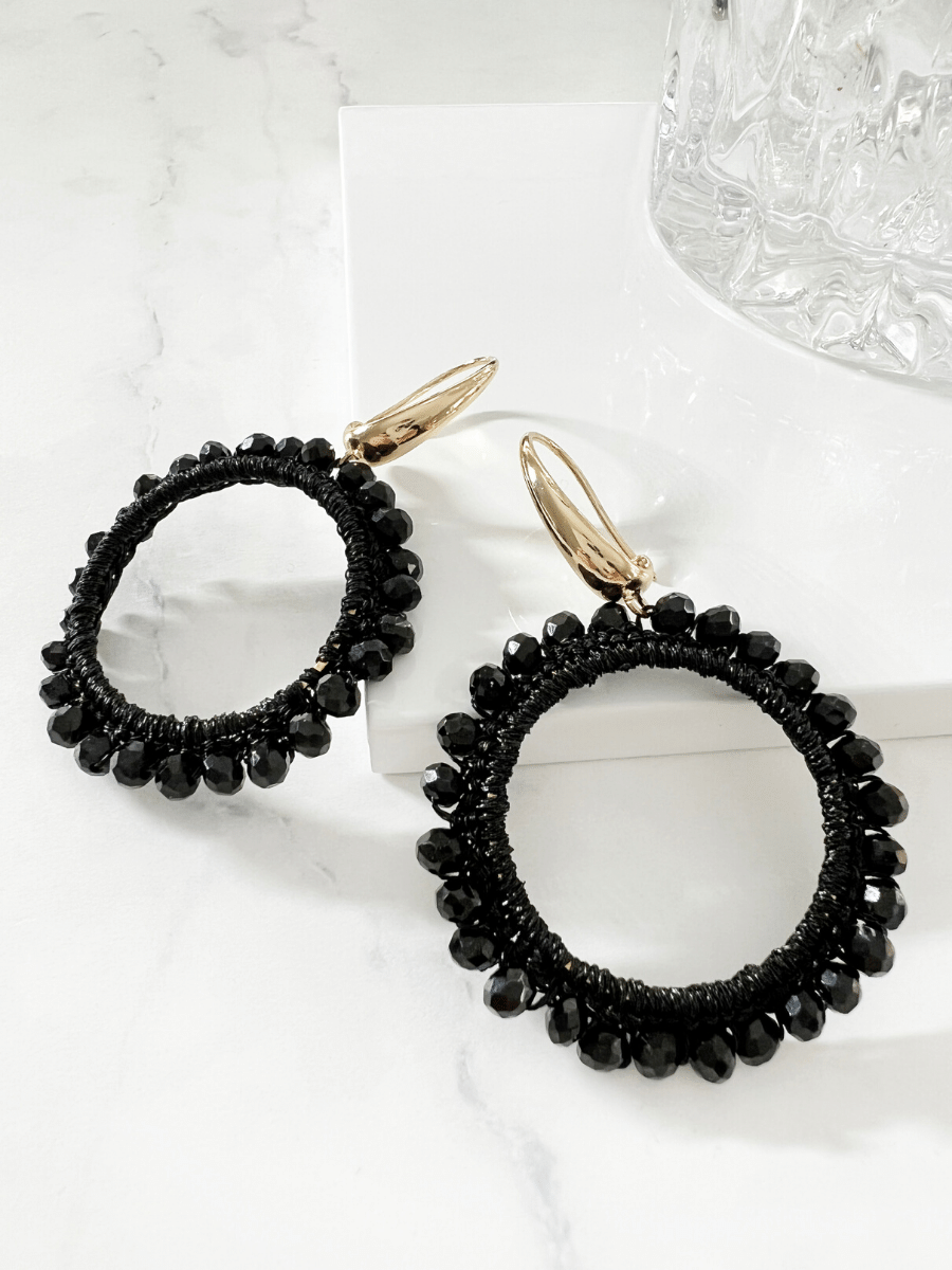 Inas oorbellen met zwarte kraaltjes