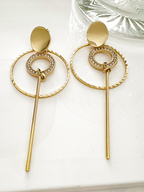 Irge lange goudkleurige oorbellen