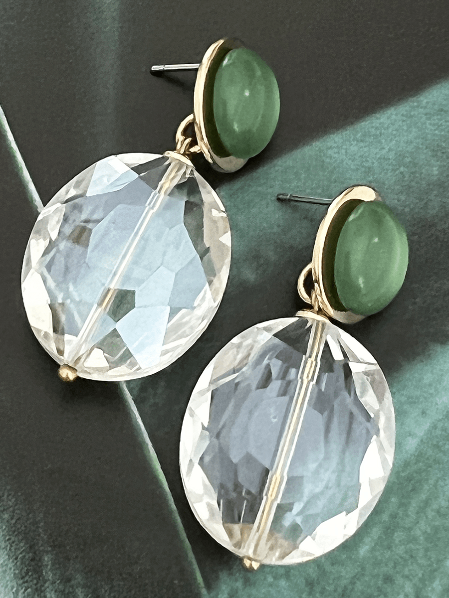 Isis oorbellen met kristal en groene steen