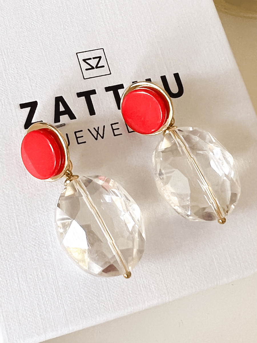 Isla oorbellen met kristal en koraaloranje steen