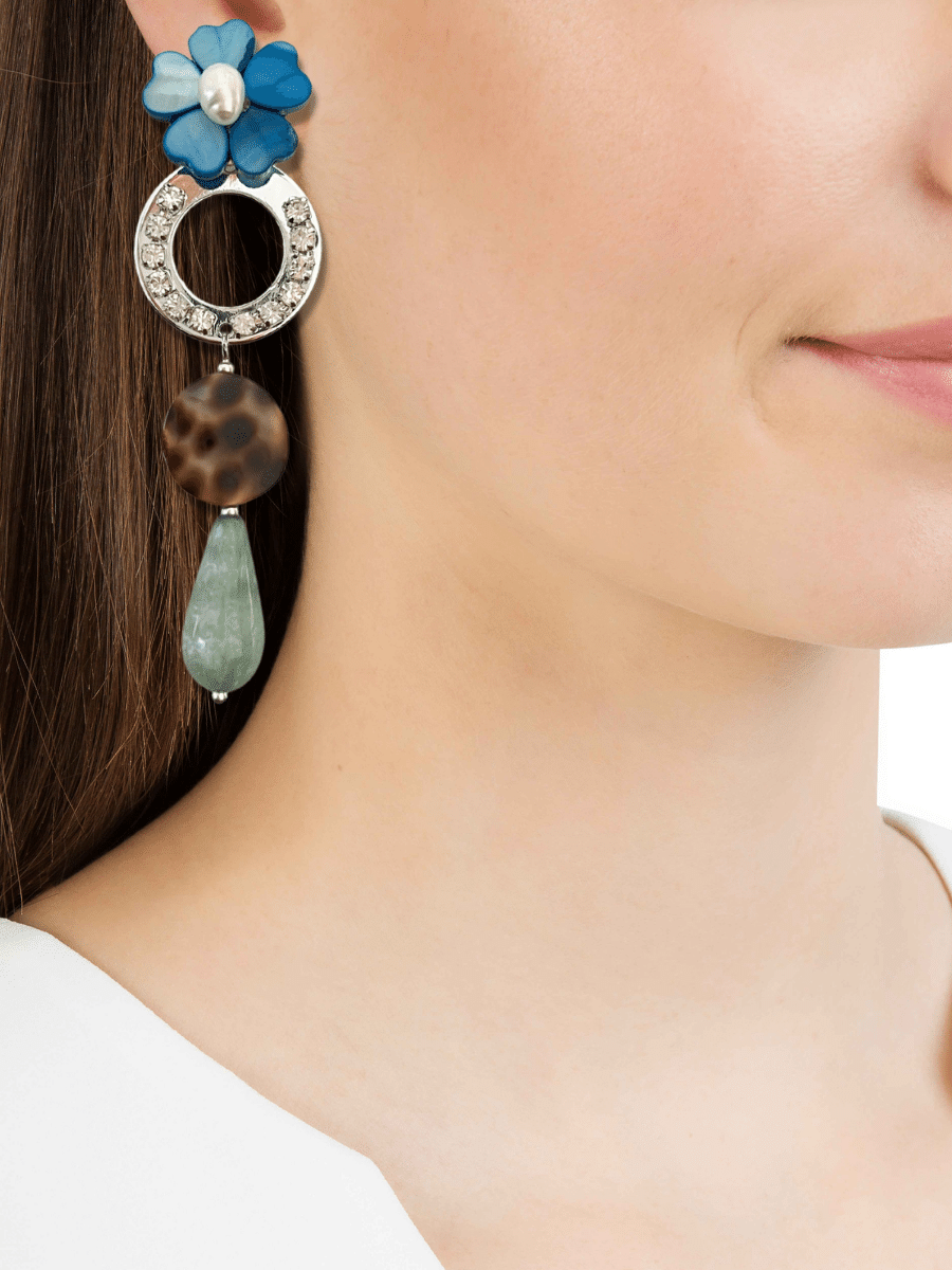 Ivis blauw groene statement oorbellen met bloem